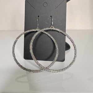 Silver dangle hoops
